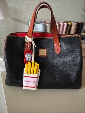 Dooney & Bourke Black Pebble Leather Satchel with Brown trim and handles